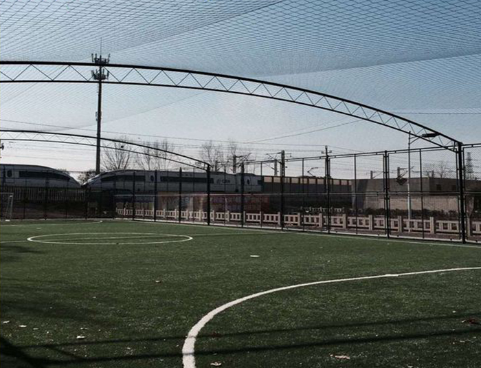 Cage football field fencing system